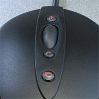 MX518 中央に配置された拡張ボタン